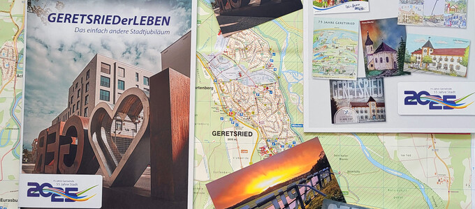 Festschrift und Postkarten zum Jubiläumsjahr 2025 | © Stadt Geretsried